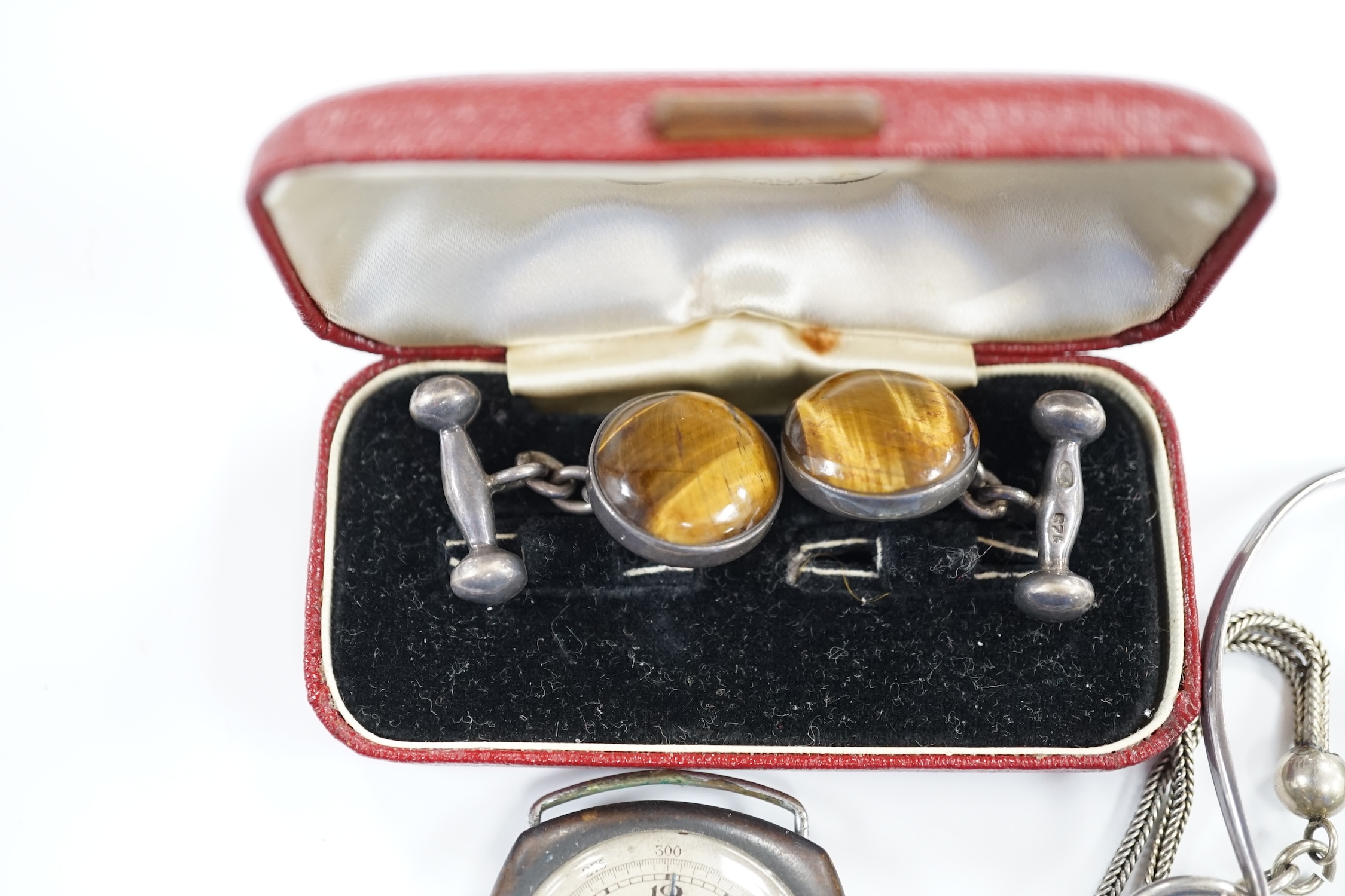 A pair of 925 and tiger's eye quartz set cufflinks, a silver and Scottish hardstone set brooch, a Scottish silver and rose quartz set bangle, a white metal fob watch and albertina and a base metal wrist watch.